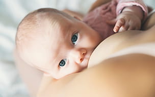 a baby breastfeeding