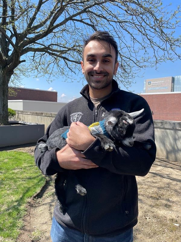 resident with goat