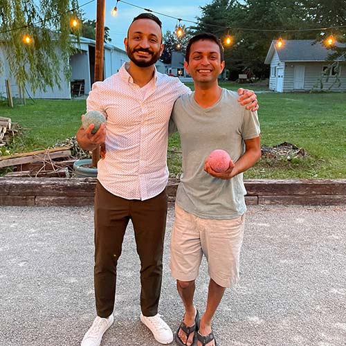 fellows playing a backyard game