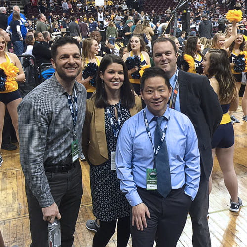 Fellows attend a basketball game