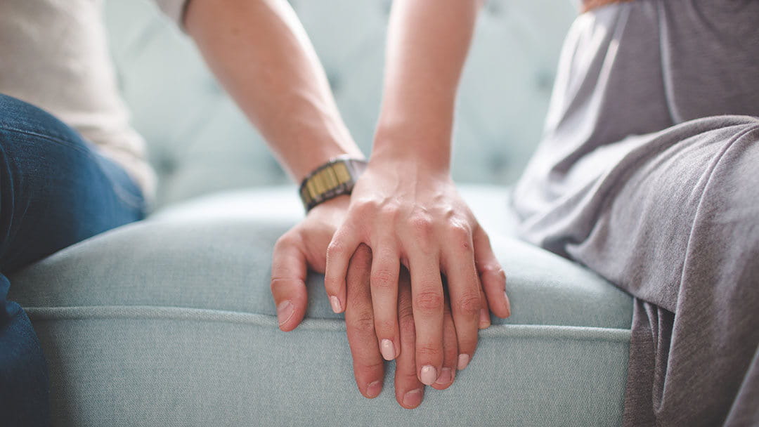 couple holding hands