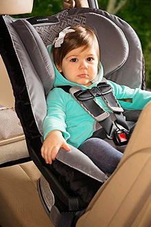 Child in car seat.